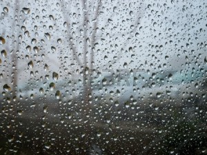 17479970-sight-to-the-moody-and-rainy-day-through-raindrops-on-a-window